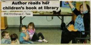Marie reading her books the Assiniboia Library
